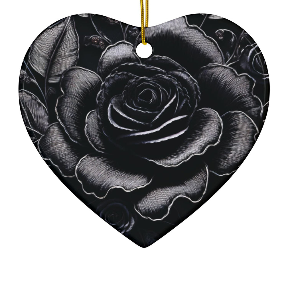 Heart-shaped ornament with black rose design on a white background
